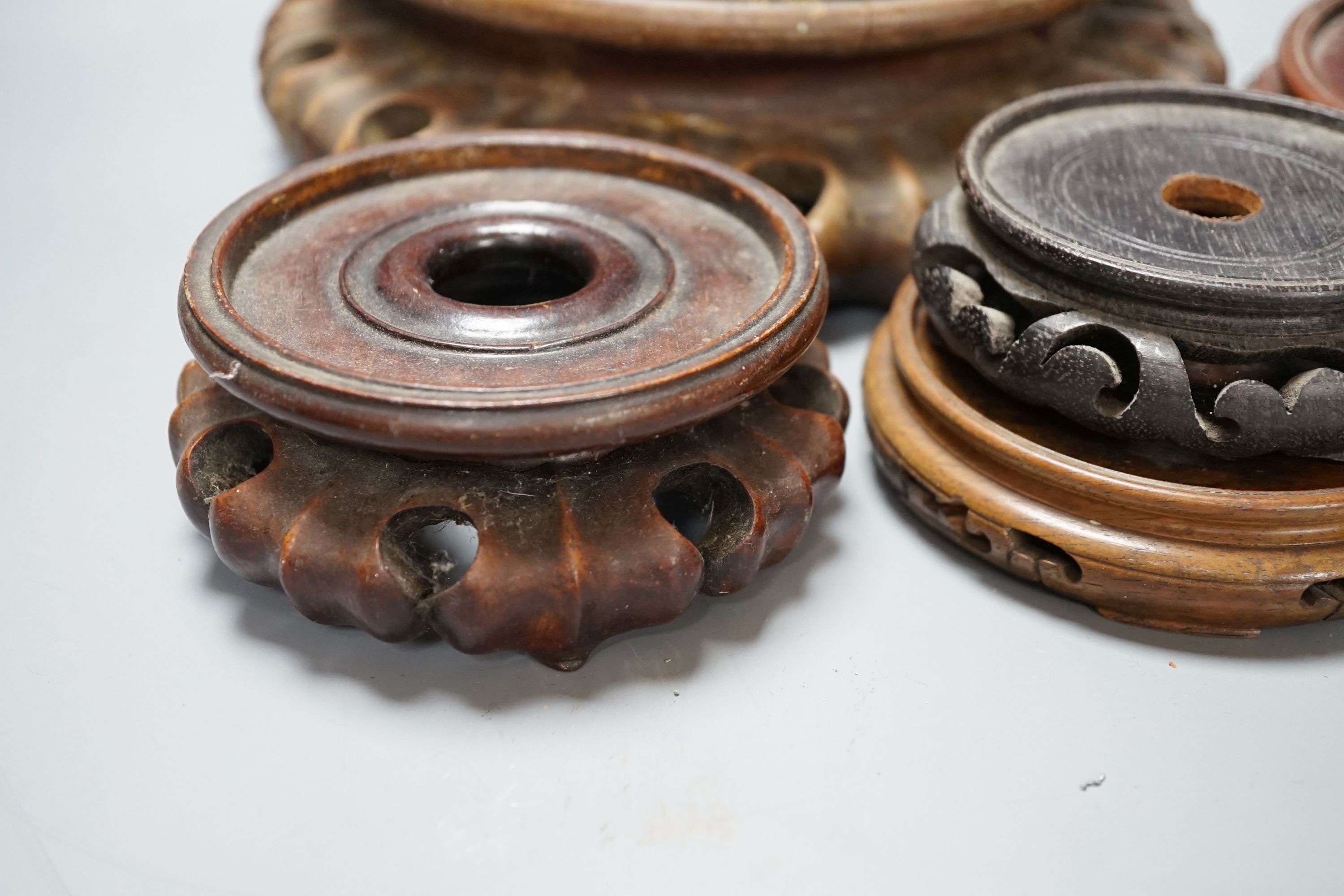 A Quantity of Oriental wooden plinths various sizes